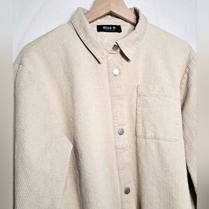 Unisex Corduroy shirt jacket by Blue B. Light tan 100% cotton button-up shirt .